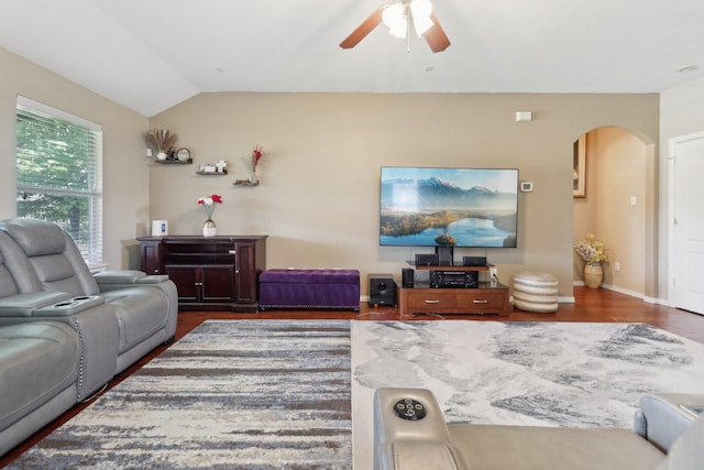 14709 Crystal Lake Dr, Little Elm, TX 75068 - living room with arched walkways, a ceiling fan, vaulted ceiling, and wood finished floors