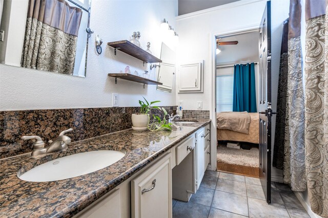 8070 Rock Brook St, Frisco, TX 75034 - bathroom featuring double vanity, tile patterned floors, and ensuite bath