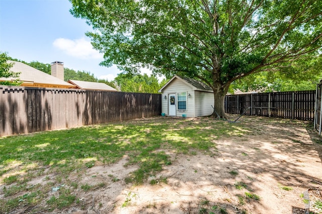 8070 Rock Brook St, Frisco, TX 75034 - fenced backyard with an outdoor structure