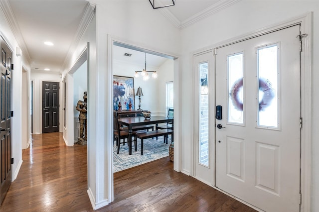 8070 Rock Brook St, Frisco, TX 75034 - foyer with dark wood finished floors, ornamental molding, and a chandelier