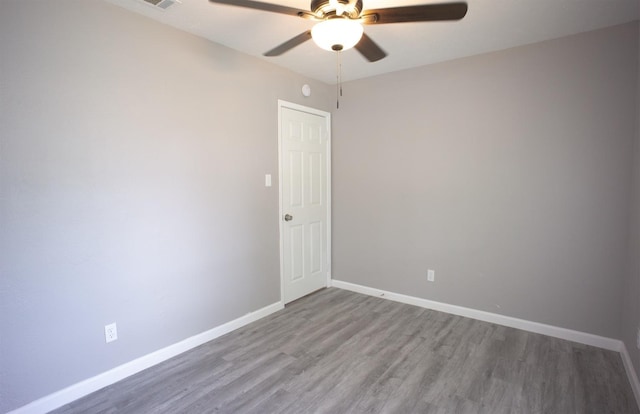 4136 Periwinkle Dr, Fort Worth, TX 76137 - empty room with a ceiling fan, wood finished floors, and baseboards