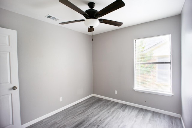 4136 Periwinkle Dr, Fort Worth, TX 76137 - unfurnished room featuring wood finished floors, ceiling fan, and baseboards