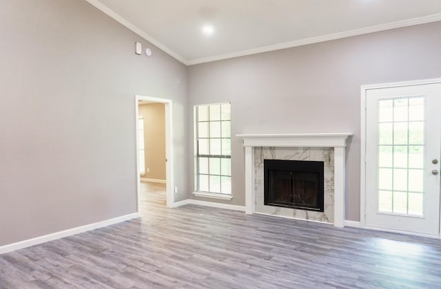4136 Periwinkle Dr, Fort Worth, TX 76137 - unfurnished living room with ornamental molding, wood finished floors, baseboards, and a fireplace