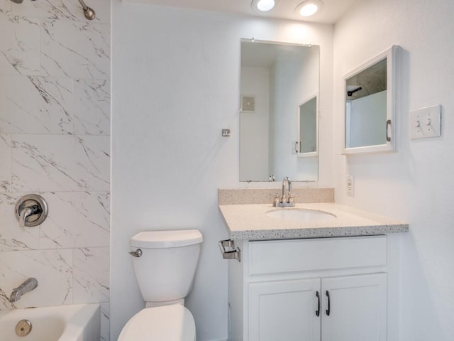 4113 Esters Rd Unit 605, Irving, TX 75038 - bathroom with vanity, toilet, and bathtub / shower combination