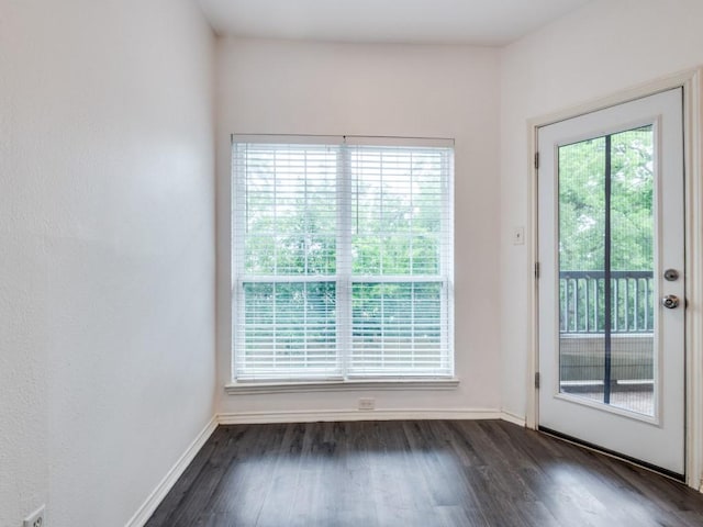 4113 Esters Rd Unit 605, Irving, TX 75038 - entryway with dark wood-type flooring and baseboards