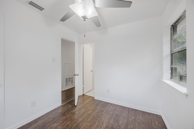1206 Curtis Dr, Garland, TX 75040 - empty room featuring baseboards, wood finished floors, and a ceiling fan