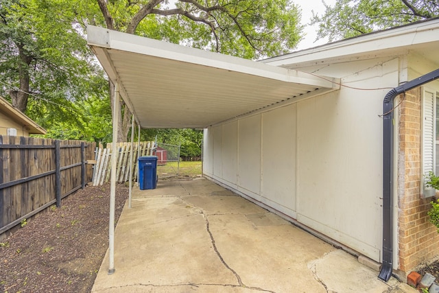 1206 Curtis Dr, Garland, TX 75040 - view of patio / terrace with a carport