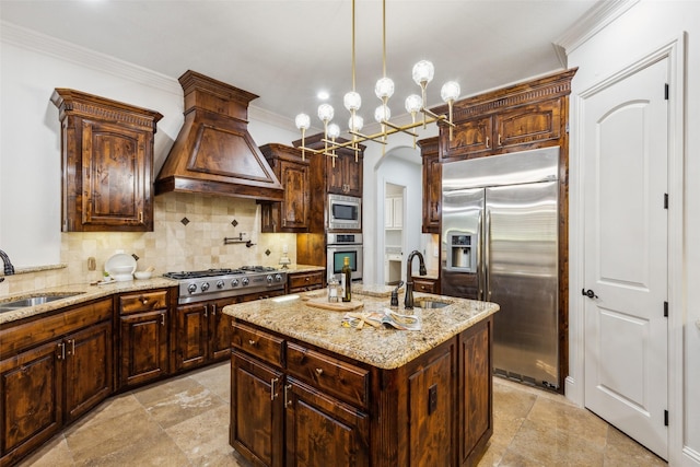 1516 Hawthorne Ln, Keller, TX 76262 - kitchen with built in appliances, a sink, custom range hood, backsplash, and ornamental molding