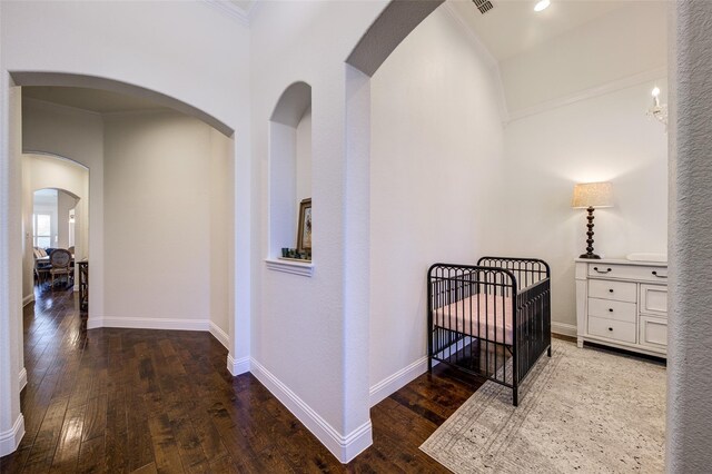 312 Spring Run Dr, Decatur, TX 76234 - hall with hardwood / wood-style flooring, crown molding, arched walkways, and baseboards