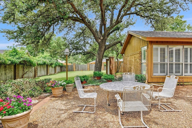 2414 Meadows Ln, Sherman, TX 75092 - view of patio / terrace featuring outdoor dining area