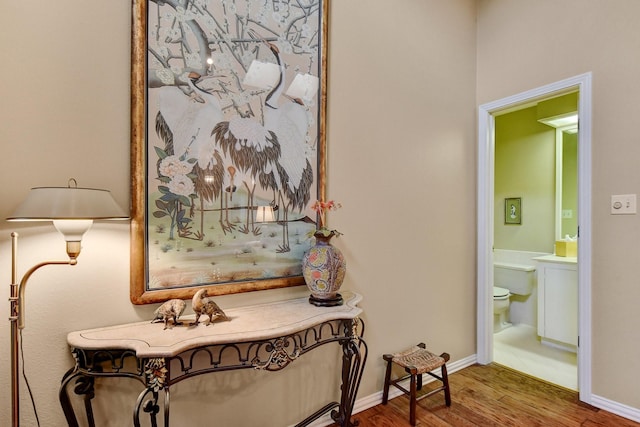 2414 Meadows Ln, Sherman, TX 75092 - corridor featuring wood finished floors and baseboards