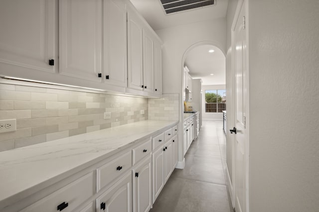850 White River Dr, Prosper, TX 75078 - hallway with arched walkways and recessed lighting