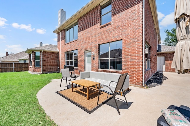 850 White River Dr, Prosper, TX 75078 - back of house featuring brick siding, a patio, a chimney, and an outdoor living space