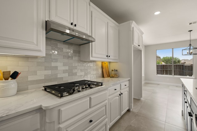 850 White River Dr, Prosper, TX 75078 - kitchen with under cabinet range hood, stainless steel gas cooktop, white cabinetry, tasteful backsplash, and recessed lighting