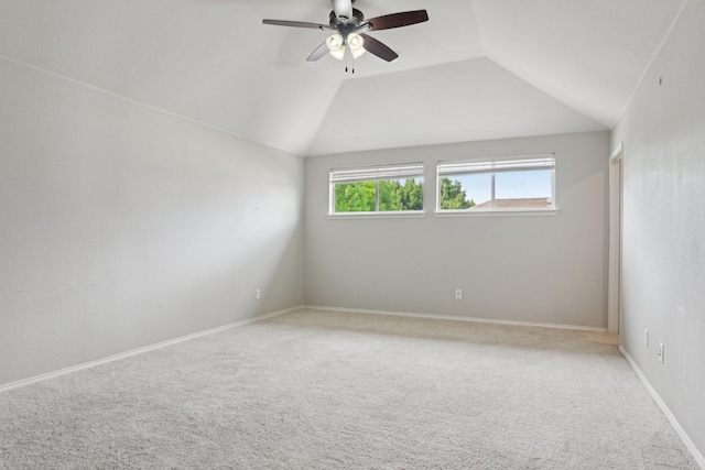 6128 Redear Dr, Fort Worth, TX 76179 - carpeted spare room featuring healthy amount of natural light, lofted ceiling, a ceiling fan, and baseboards