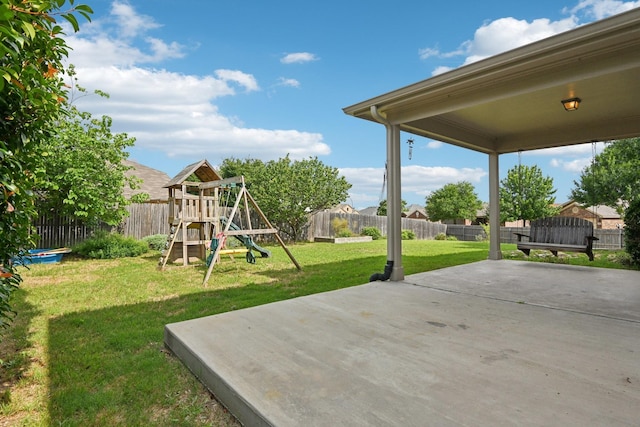 6128 Redear Dr, Fort Worth, TX 76179 - view of yard featuring a patio area and a playground
