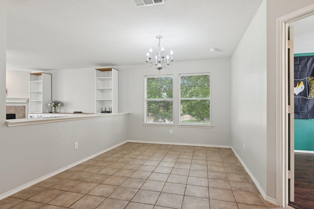 6128 Redear Dr, Fort Worth, TX 76179 - unfurnished dining area featuring a chandelier and light tile patterned floors