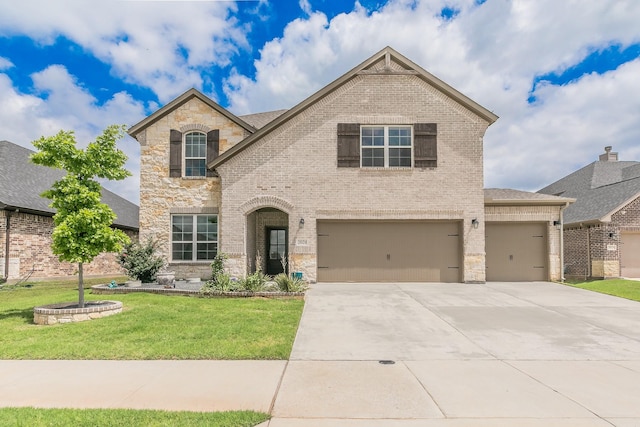 2028 Proteus Dr, Haslet, TX 76052 - french country style house with brick siding, a front lawn, driveway, and stone siding