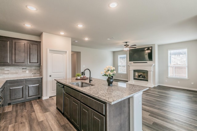 2028 Proteus Dr, Haslet, TX 76052 - kitchen featuring a sink, stainless steel dishwasher, ceiling fan, dark wood-style floors, and recessed lighting