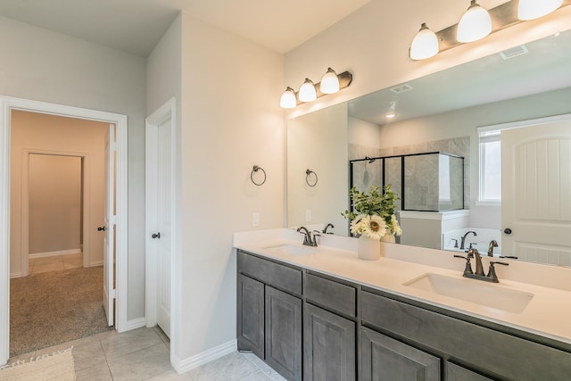 2028 Proteus Dr, Haslet, TX 76052 - bathroom featuring double vanity, a tile shower, tile patterned flooring, and baseboards