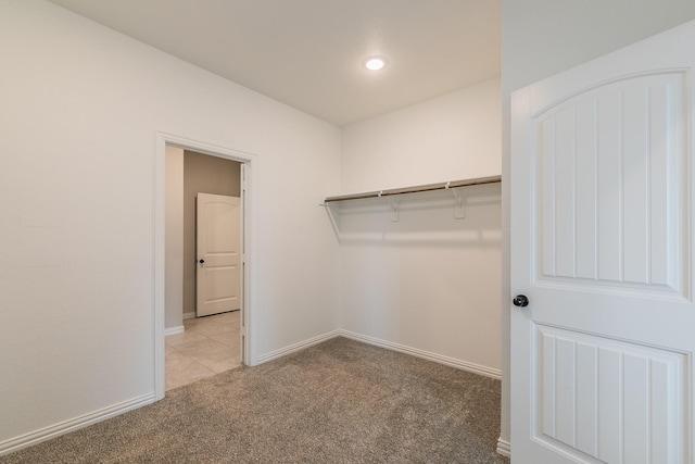2028 Proteus Dr, Haslet, TX 76052 - walk in closet with carpet and tile patterned floors