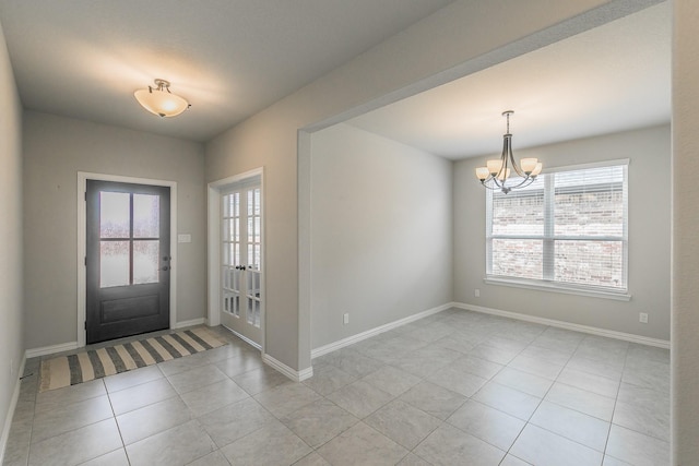 2028 Proteus Dr, Haslet, TX 76052 - entryway with plenty of natural light, light tile patterned floors, and a chandelier
