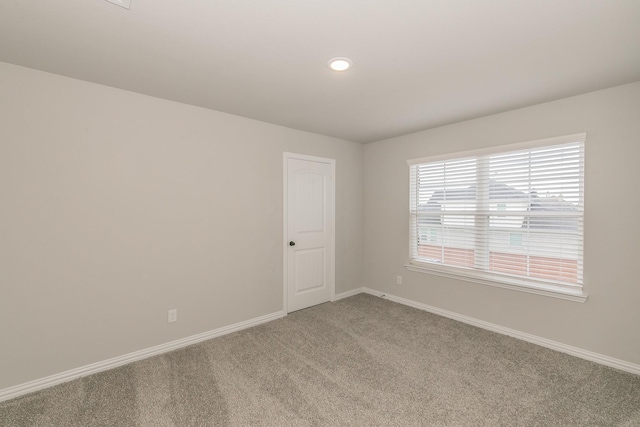 2028 Proteus Dr, Haslet, TX 76052 - unfurnished room featuring light carpet, baseboards, and recessed lighting