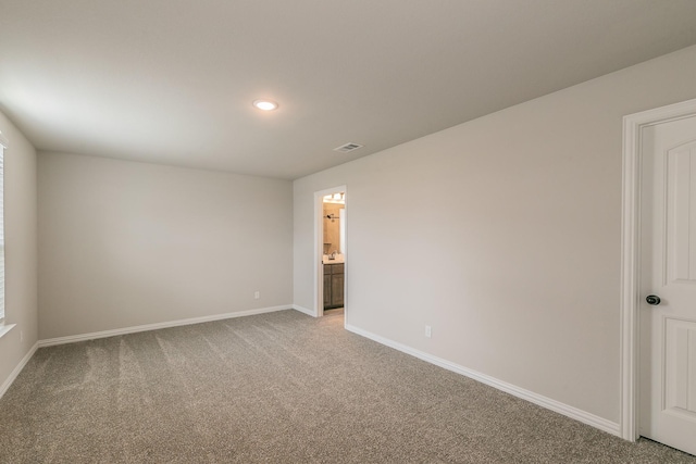 2028 Proteus Dr, Haslet, TX 76052 - empty room featuring light carpet, baseboards, and recessed lighting