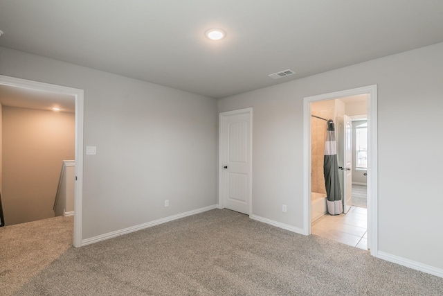 2028 Proteus Dr, Haslet, TX 76052 - unfurnished bedroom featuring carpet, baseboards, ensuite bathroom, and recessed lighting