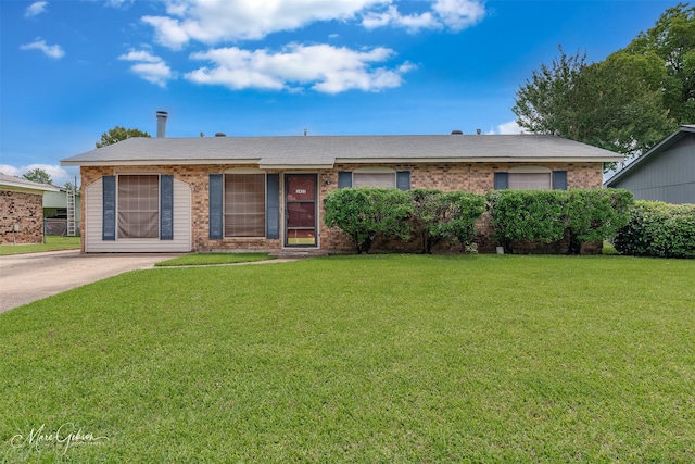 3425 Ponderosa Dr, Bossier City, LA 71112 - ranch-style home featuring a front lawn and brick siding
