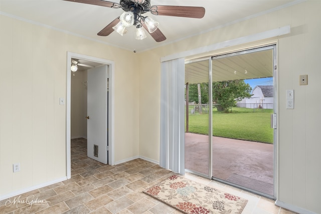 3425 Ponderosa Dr, Bossier City, LA 71112 - spare room featuring a ceiling fan, crown molding, light stone finish floors, and baseboards