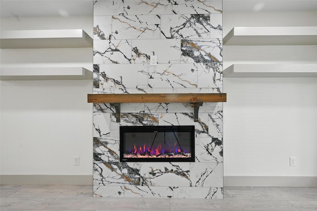 2614 E Mitchell St, Arlington, TX 76010 - detailed view of baseboards and a fireplace