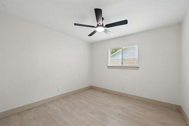 2614 E Mitchell St, Arlington, TX 76010 - spare room with ceiling fan, light wood-type flooring, and baseboards