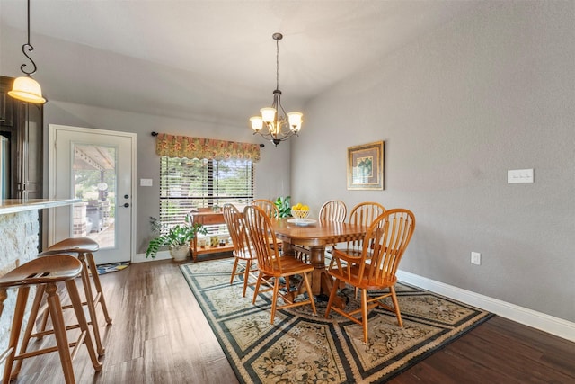 225 County Road 3525, Paradise, TX 76073 - dining space with a chandelier, wood finished floors, and baseboards