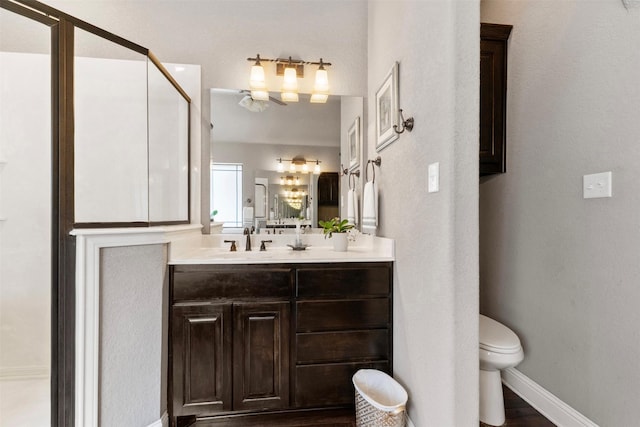225 County Road 3525, Paradise, TX 76073 - full bathroom with vanity, toilet, and baseboards