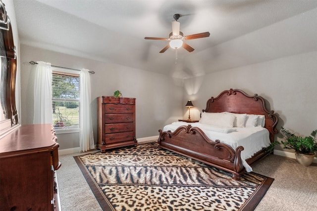 225 County Road 3525, Paradise, TX 76073 - bedroom with carpet flooring, baseboards, and a ceiling fan