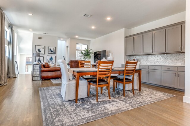 8120 Radnor Rd, Dallas, TX 75231 - dining room featuring wood finished floors and recessed lighting