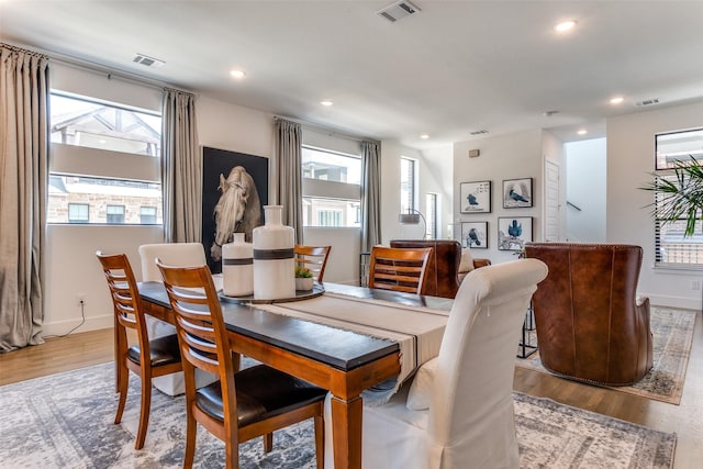 8120 Radnor Rd, Dallas, TX 75231 - dining space featuring wood finished floors, recessed lighting, and baseboards