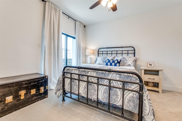 8120 Radnor Rd, Dallas, TX 75231 - carpeted bedroom with a ceiling fan and baseboards