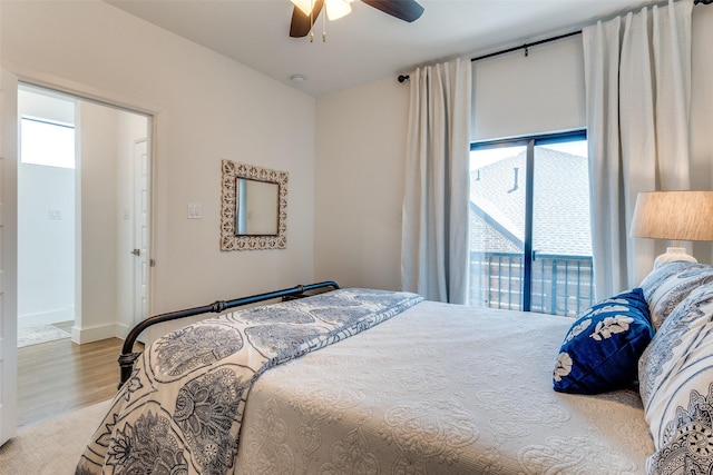 8120 Radnor Rd, Dallas, TX 75231 - bedroom with wood finished floors, a ceiling fan, and baseboards