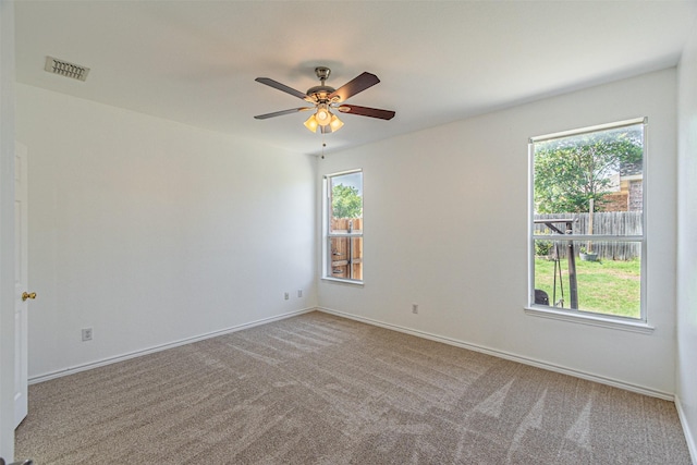 1301 Hennessey Ct, Fort Worth, TX 76131 - carpeted spare room with healthy amount of natural light, a ceiling fan, and baseboards