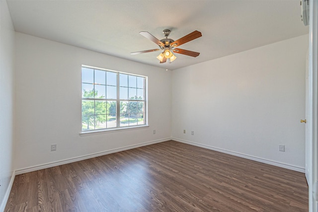 1301 Hennessey Ct, Fort Worth, TX 76131 - unfurnished room featuring dark wood-style floors, baseboards, and ceiling fan