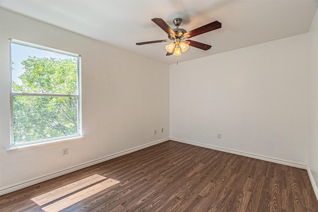 1301 Hennessey Ct, Fort Worth, TX 76131 - unfurnished room with healthy amount of natural light, dark wood-type flooring, and baseboards