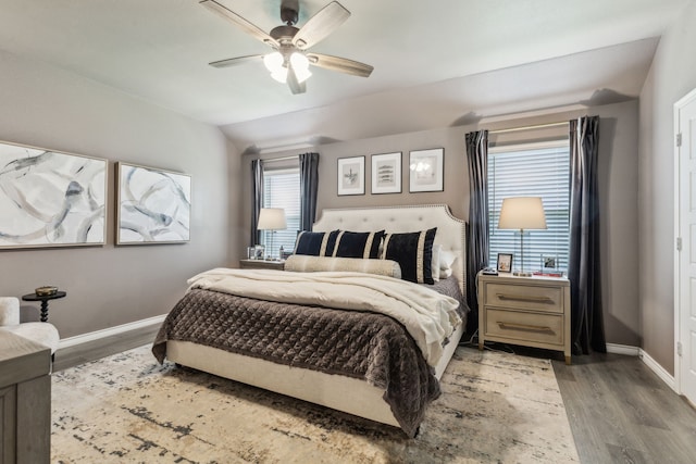 1104 Egret Way, Celina, TX 75009 - bedroom featuring wood finished floors, baseboards, ceiling fan, and lofted ceiling