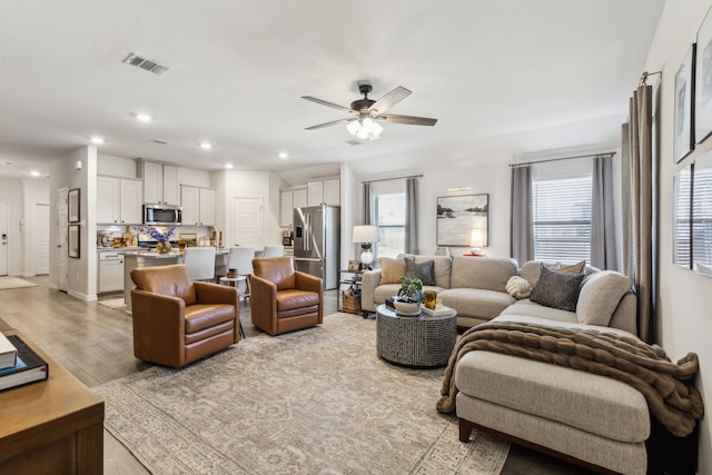 1104 Egret Way, Celina, TX 75009 - living room with recessed lighting, a ceiling fan, and light wood-style flooring
