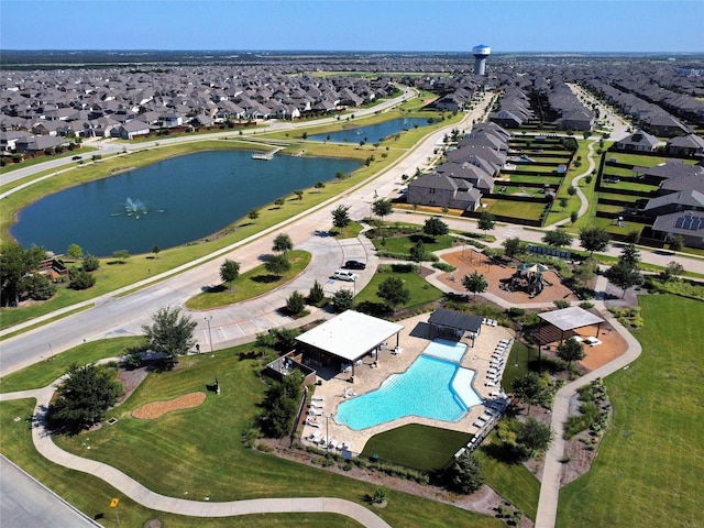 2809 Lakeside Dr, Aubrey, TX 76227 - aerial view of property and surrounding area with a large body of water, nearby suburban area, and a pool area