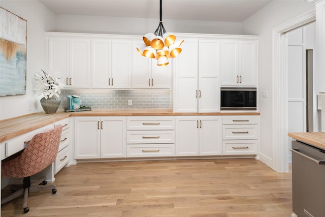 4155 American Pharoah Way, Celina, TX 75009 - kitchen featuring stainless steel dishwasher, black microwave, wood counters, a chandelier, and white cabinetry