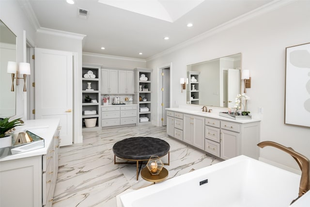 4155 American Pharoah Way, Celina, TX 75009 - bathroom featuring recessed lighting, two vanities, a freestanding tub, ornamental molding, and marble tiled flooring