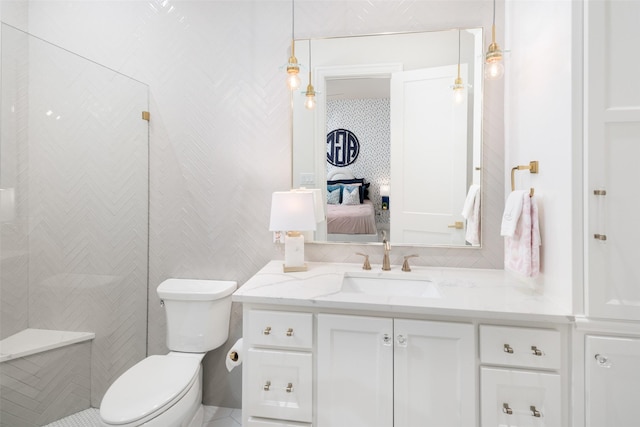 4155 American Pharoah Way, Celina, TX 75009 - bathroom with vanity, toilet, ensuite bath, and tiled shower