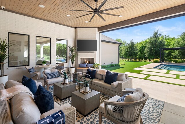 4155 American Pharoah Way, Celina, TX 75009 - view of patio with an outdoor living space with a fireplace and a ceiling fan